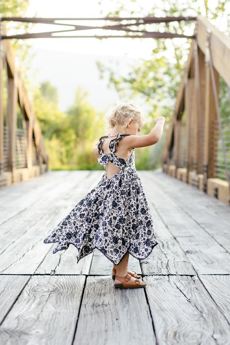Emery twirling on the bridge