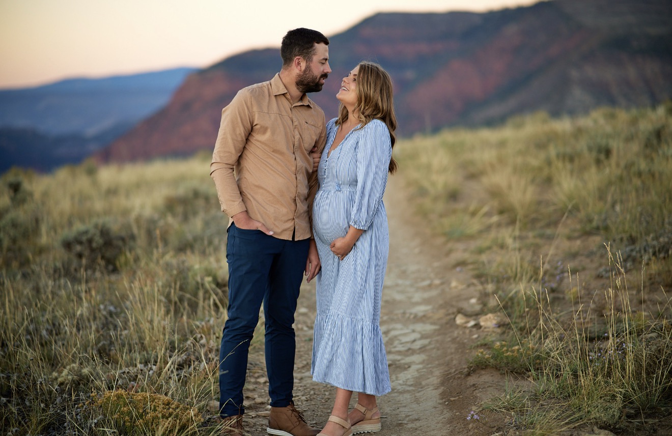 Kelsey pregnant with Ellison at sunset