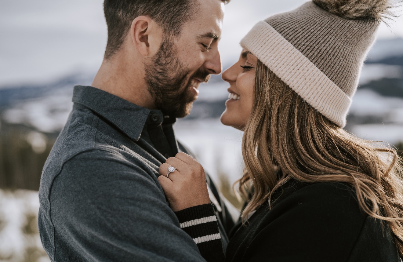 Nolan and Kelsey, engaged, in the mountains
